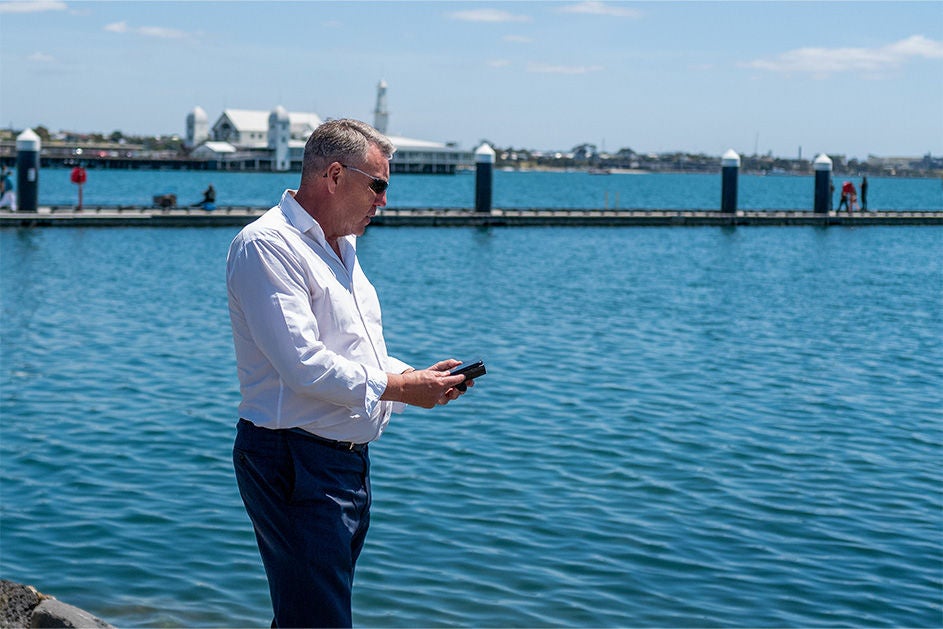 Maurice Blackburn client Mark standing by the seaside