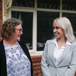 Lawyer smiling with their client