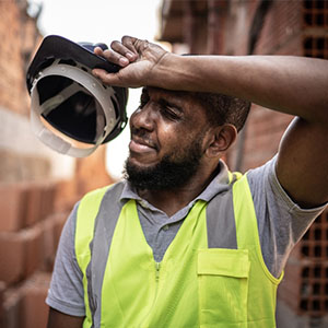 Construction worker sweating from the heat